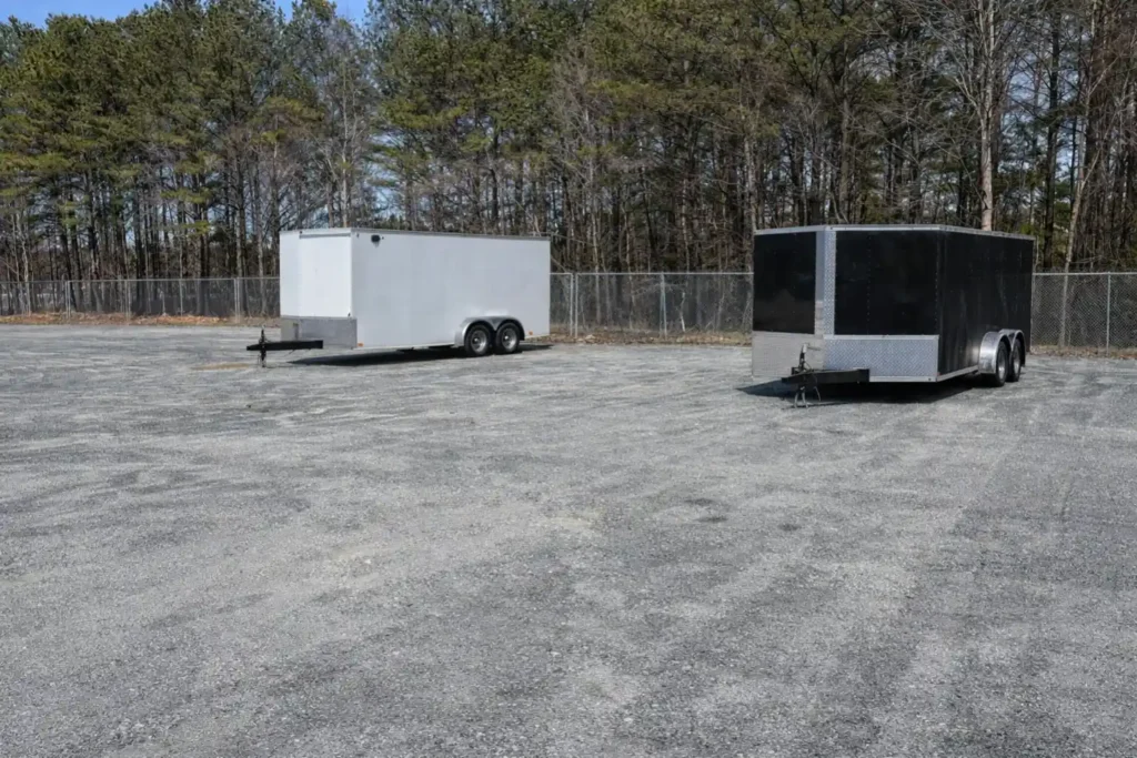 Outdoor trailer storage in Marietta GA with secure gravel parking for enclosed trailers